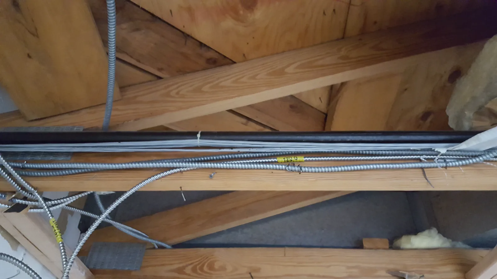 Low-voltage wiring routed alongside gas pipes