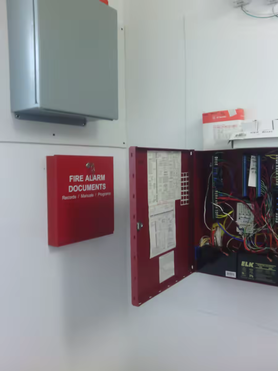 Existing combination fire and burglar alarm auxiliary and power panel