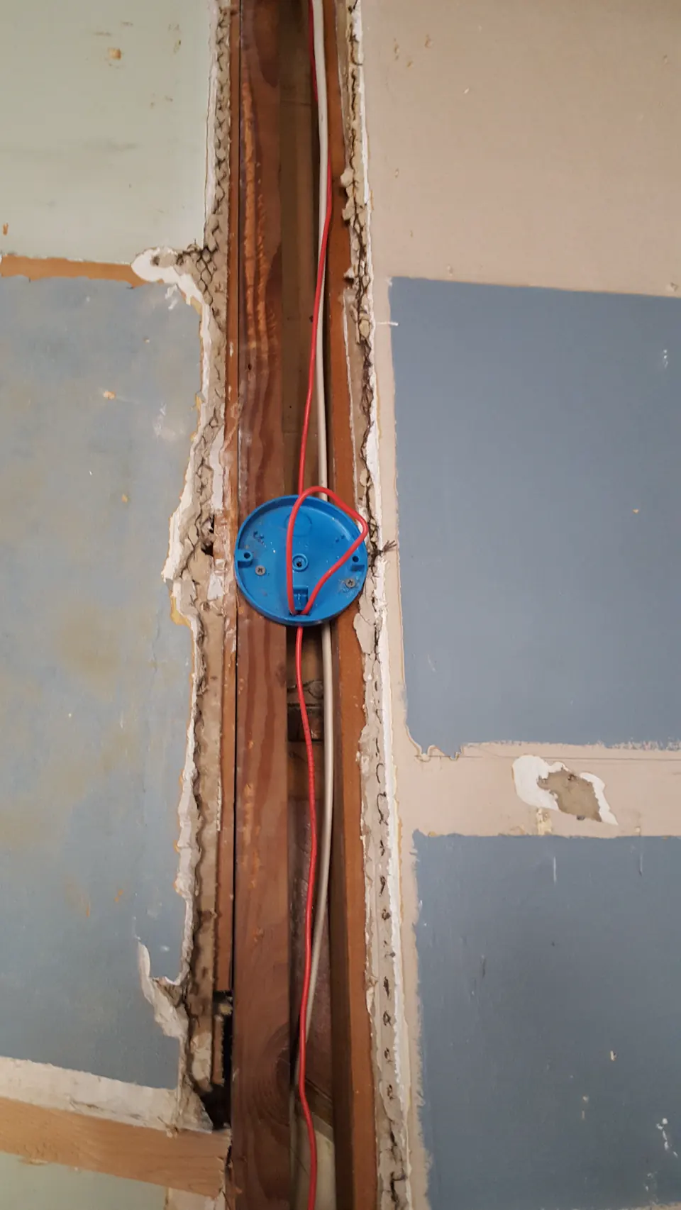 An electrical box and wiring installed in an exposed wall channel