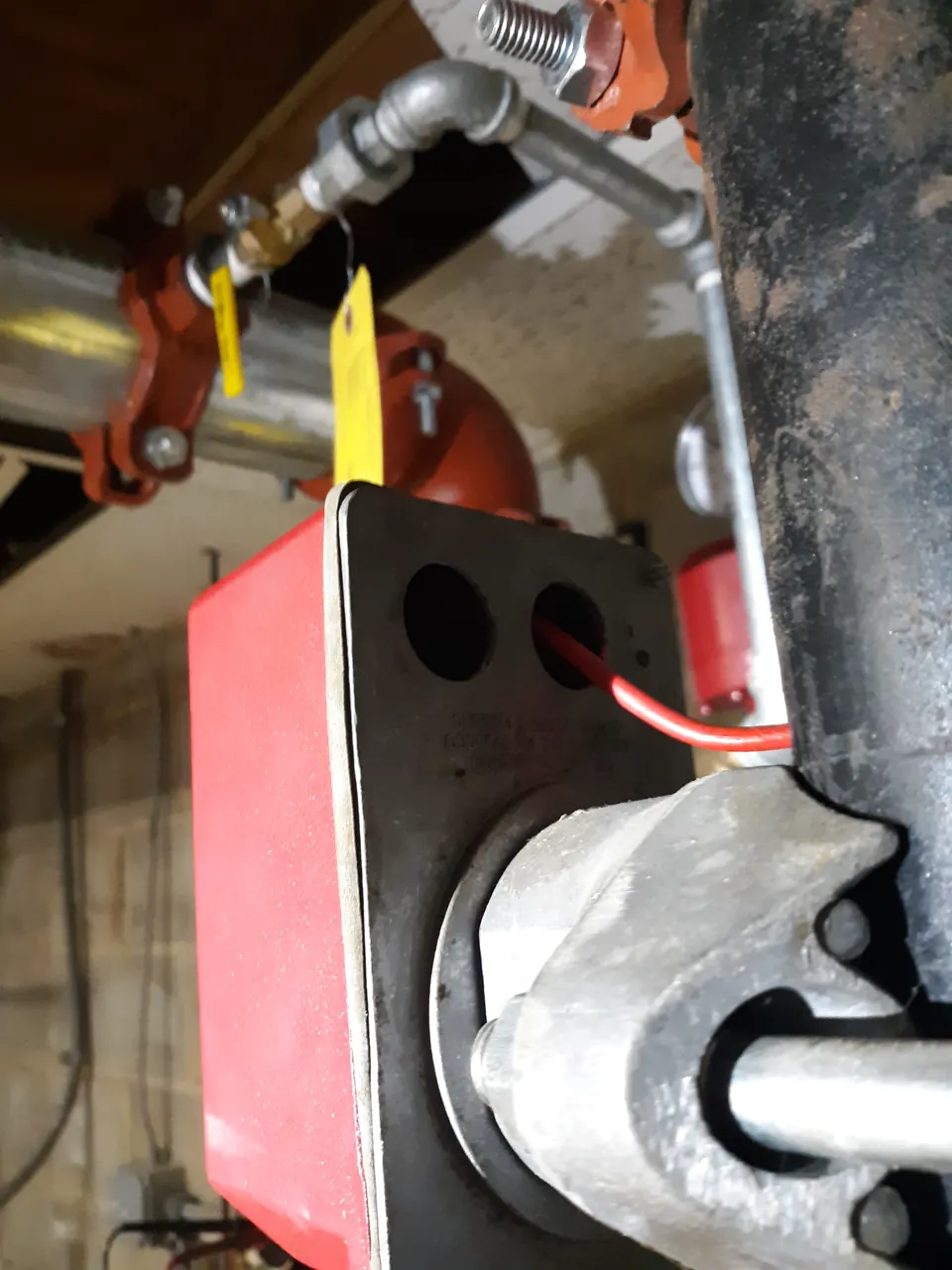 A waterflow device wired through an unprotected opening